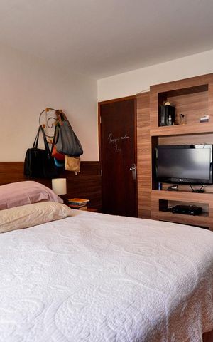 Casa à venda com 250m², 3 quartos e 2 vagasQuarto Suíte