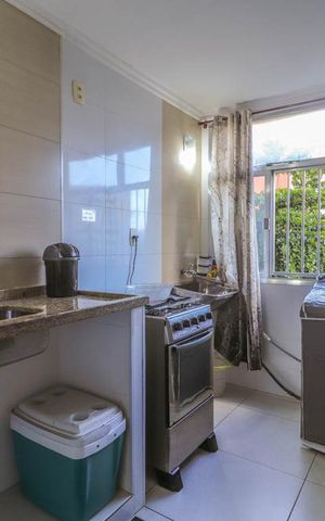 Apartamento à venda com 60m², 2 quartos e 1 vaga Apartamento à venda com 60m², 2 quartos e 1 vagaCozinha e Área de Serviço