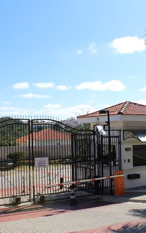 Casa de condomínio à venda com 69m², 2 quartos e 1 vagaFachada e portaria