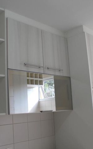 Casa de condomínio à venda com 69m², 2 quartos e 1 vagaCozinha - Armários