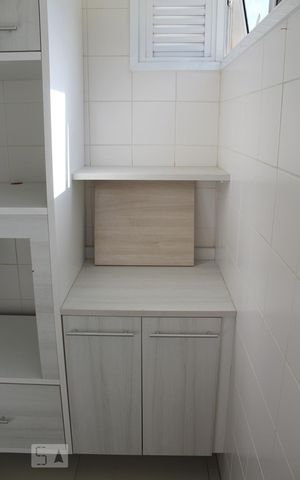 Casa de condomínio à venda com 69m², 2 quartos e 1 vagaCozinha e Área de Serviço