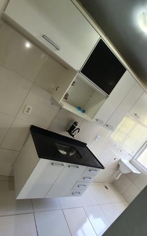 Apartamento à venda com 60m², 2 quartos e 1 vaga Apartamento à venda com 60m², 2 quartos e 1 vagaCozinha e Área de Serviço