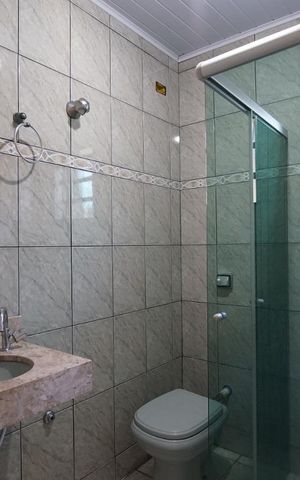 Casa à venda com 100m², 3 quartos e 2 vagasBanheiro social