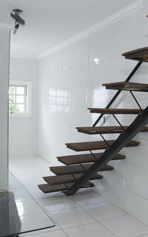 Casa de condomínio à venda com 90m², 2 quartos e sem vagaDetalhe Sala