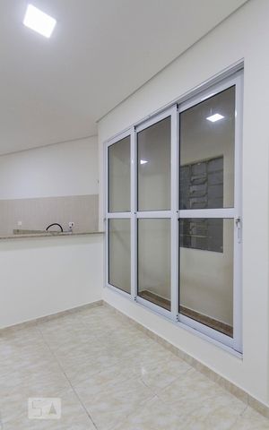 Apartamento para alugar com 64m², 2 quartos e sem vagaPorta de vidro da Varanda