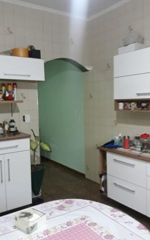 Casa à venda com 140m², 3 quartos e 2 vagas Casa à venda com 140m², 3 quartos e 2 vagasCozinha