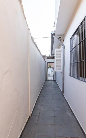 Casa à venda com 115m², 3 quartos e 3 vagas Casa à venda com 115m², 3 quartos e 3 vagasCorredor externo