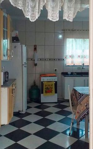 Casa à venda com 270m², 4 quartos e 6 vagas Casa à venda com 270m², 4 quartos e 6 vagasCozinha