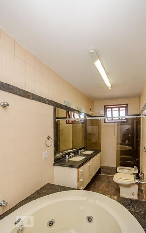 Casa à venda com 380m², 4 quartos e 4 vagasBanheiro Suíte master
