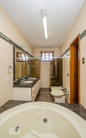 Casa à venda com 380m², 4 quartos e 4 vagasBanheiro Suíte master