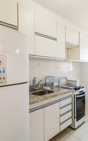 Apartamento à venda com 50m², 2 quartos e 1 vaga Apartamento à venda com 50m², 2 quartos e 1 vagaCozinha e Área de Serviço