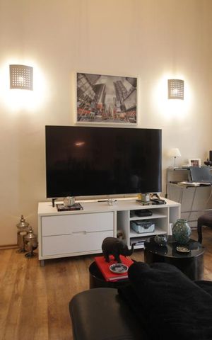 Apartamento para alugar com 58m², 1 quarto e 2 vagasSala