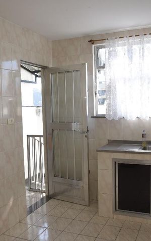 Casa de condomínio para alugar com 160m², 2 quartos e 3 vagasCozinha 
