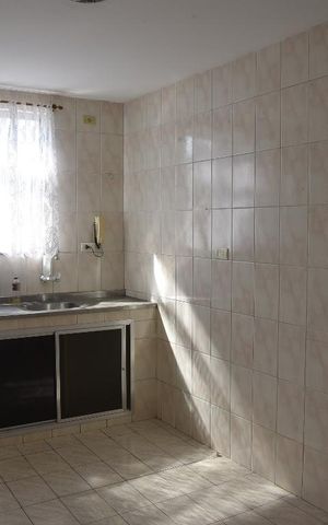 Casa de condomínio para alugar com 160m², 2 quartos e 3 vagasCozinha 