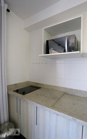 Studio à venda com 32m², 1 quarto e 1 vagaCozinha