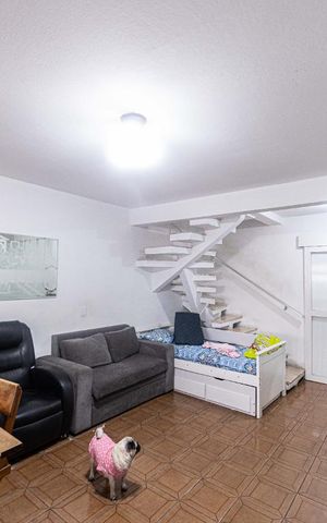 Casa à venda com 105m², 2 quartos e 2 vagas Casa à venda com 105m², 2 quartos e 2 vagasSala