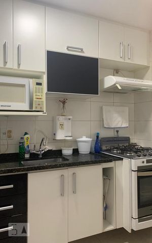 Apartamento à venda com 54m², 2 quartos e 1 vaga Apartamento à venda com 54m², 2 quartos e 1 vagaCozinha e Área de Serviço