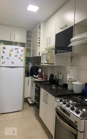 Apartamento à venda com 54m², 2 quartos e 1 vaga Apartamento à venda com 54m², 2 quartos e 1 vagaCozinha e Área de Serviço