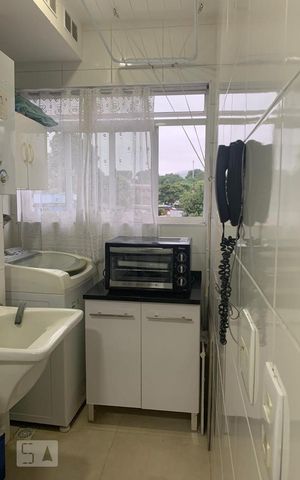 Apartamento à venda com 54m², 2 quartos e 1 vaga Apartamento à venda com 54m², 2 quartos e 1 vagaCozinha e Área de Serviço
