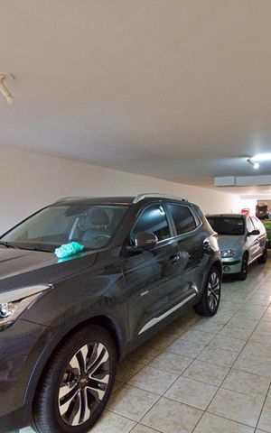 Casa à venda com 315m², 3 quartos e 4 vagas Casa à venda com 315m², 3 quartos e 4 vagasGaragem