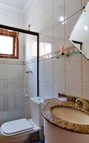 Casa à venda com 315m², 3 quartos e 4 vagas Casa à venda com 315m², 3 quartos e 4 vagasBanheiro da Suíte 3