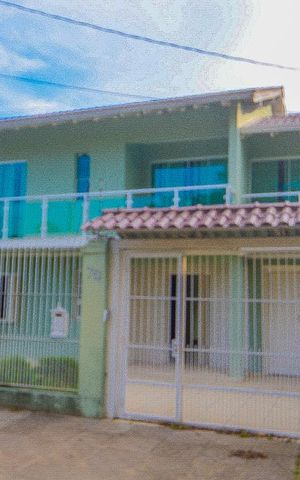 Casa à venda com 400m², 4 quartos e 4 vagas Casa à venda com 400m², 4 quartos e 4 vagasFachada