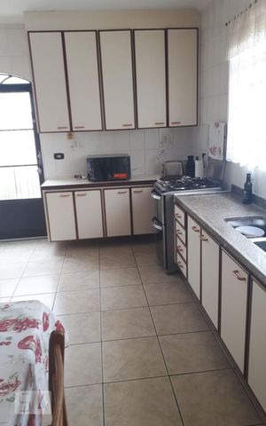 Casa à venda com 125m², 3 quartos e 3 vagas Casa à venda com 125m², 3 quartos e 3 vagasCozinha