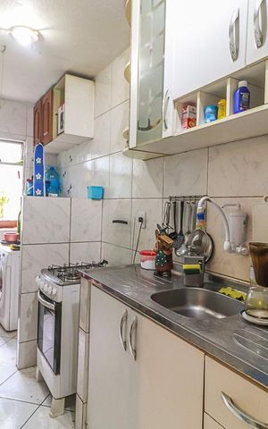 Apartamento à venda com 48m², 2 quartos e 1 vaga Apartamento à venda com 48m², 2 quartos e 1 vagaCozinha e Área de Serviço