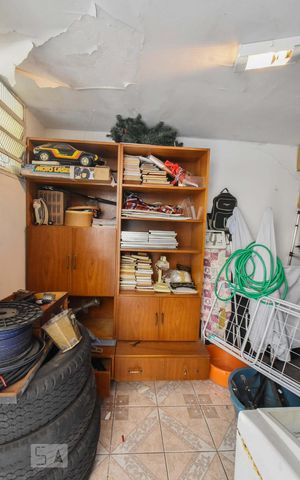 Casa à venda com 413m², 5 quartos e 4 vagasQuarto de Serviços