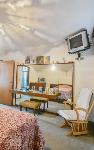 Casa à venda com 413m², 5 quartos e 4 vagasSuíte 01