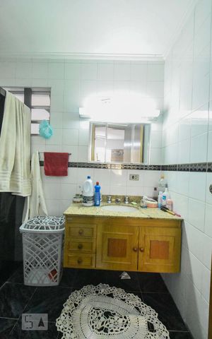 Casa à venda com 413m², 5 quartos e 4 vagasBanheiro Suíte 04