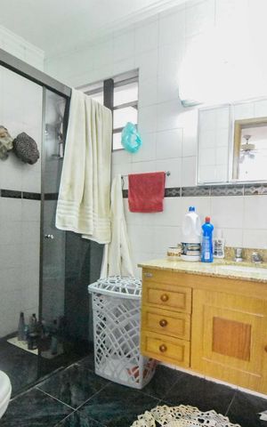Casa à venda com 413m², 5 quartos e 4 vagasBanheiro Suíte 04