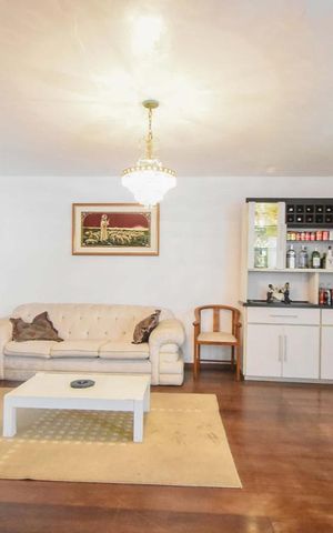 Casa à venda com 413m², 5 quartos e 4 vagasSala de Estar