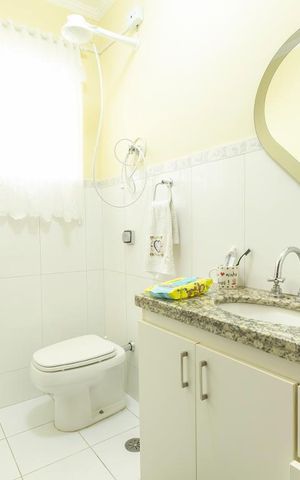 Casa à venda com 320m², 4 quartos e 2 vagasBanheiro