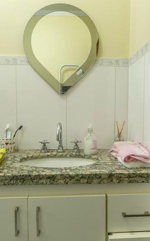 Casa à venda com 320m², 4 quartos e 2 vagasBanheiro