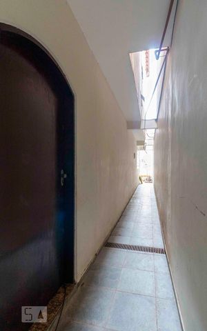 Casa à venda com 300m², 4 quartos e 2 vagasCorredor Externo - Porta de Entrada
