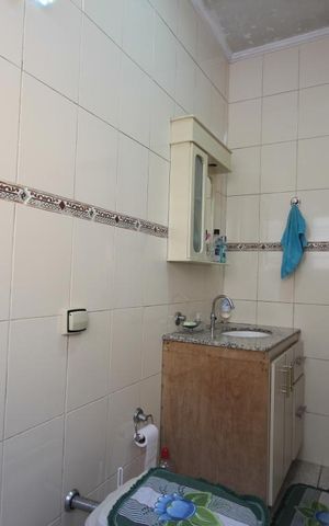 Casa à venda com 200m², 4 quartos e 3 vagasBanheiro