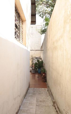 Casa à venda com 200m², 4 quartos e 3 vagasCorredor Quintal