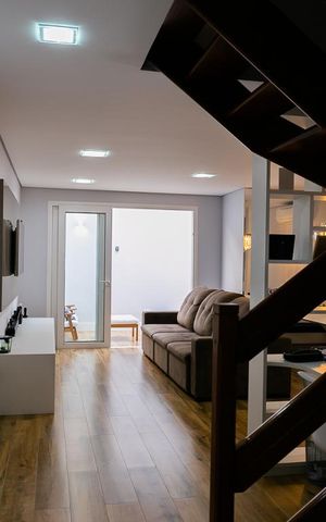 Casa de condomínio à venda com 105m², 3 quartos e 2 vagas Casa de condomínio à venda com 105m², 3 quartos e 2 vagasSala