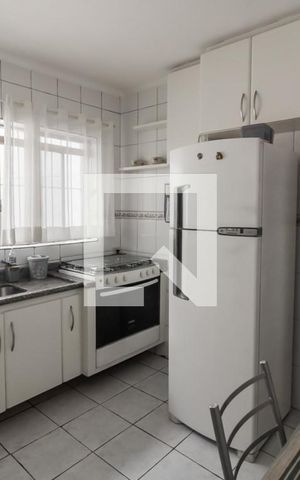 Casa à venda com 125m², 2 quartos e 2 vagas Casa à venda com 125m², 2 quartos e 2 vagasCozinha