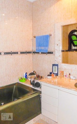 Casa à venda com 290m², 5 quartos e 5 vagasBanheiro 2