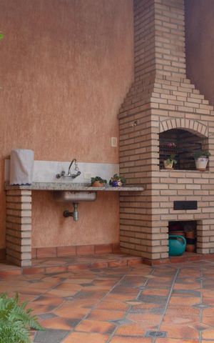 Casa à venda com 225m², 3 quartos e 3 vagas Casa à venda com 225m², 3 quartos e 3 vagasChurrasqueira