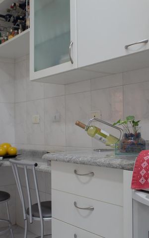 Casa à venda com 225m², 3 quartos e 3 vagas Casa à venda com 225m², 3 quartos e 3 vagasCozinha