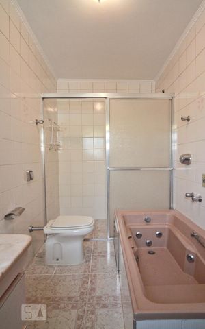 Casa à venda com 320m², 4 quartos e 2 vagasBanheiro da Suíte 2