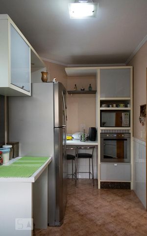 Casa à venda com 230m², 4 quartos e 4 vagas Casa à venda com 230m², 4 quartos e 4 vagasCOZINHA