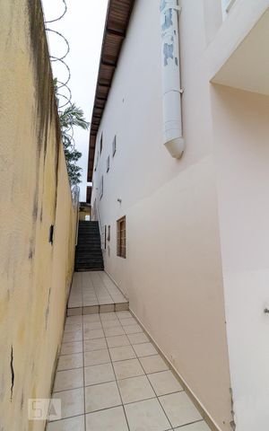 Casa para alugar com 380m², 4 quartos e 4 vagasÁrea externa lateral