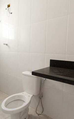 Casa de condomínio à venda com 180m², 3 quartos e 4 vagas Casa de condomínio à venda com 180m², 3 quartos e 4 vagasBanheiro da Suíte 1