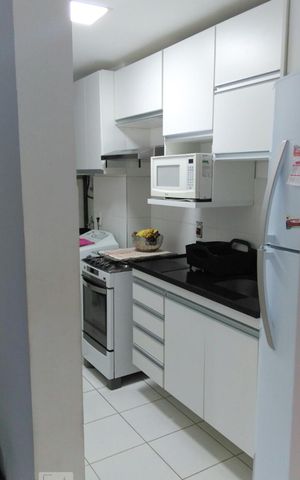 Apartamento à venda com 55m², 2 quartos e 1 vaga Apartamento à venda com 55m², 2 quartos e 1 vagaCozinha e Área de Serviço