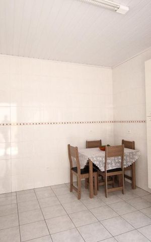 Casa à venda com 120m², 2 quartos e 2 vagas Casa à venda com 120m², 2 quartos e 2 vagasCozinha