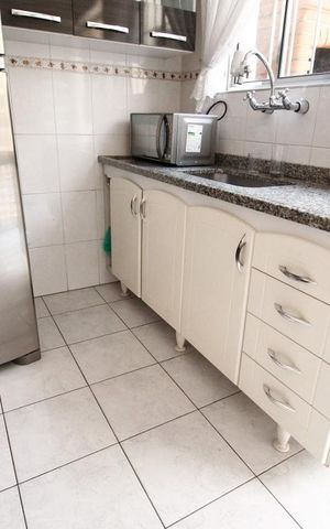 Casa à venda com 120m², 2 quartos e 2 vagas Casa à venda com 120m², 2 quartos e 2 vagasCozinha